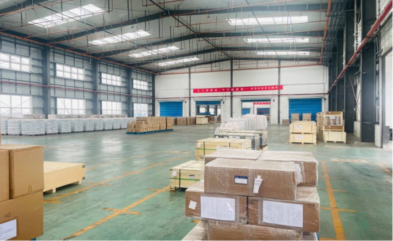 Warehouse interior with natural light and organized pallets